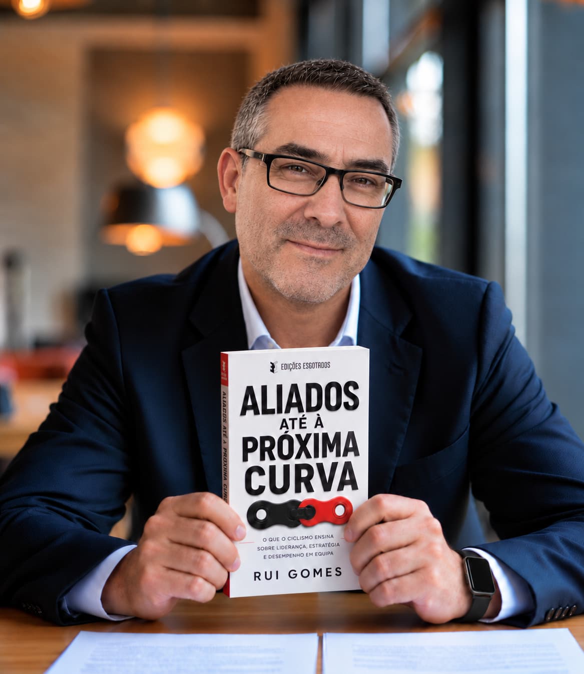 Rui Gomes, author of Allies Until the Next Bend, holding a copy of the book